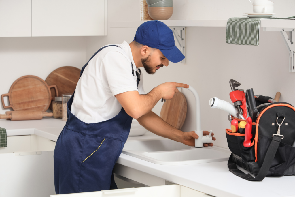 Wendig plumber installing a new kitchen faucet in a Chester County, PA home